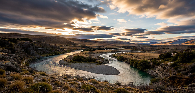 The Río Gallegos winding through the Patagonian steppe at sunset